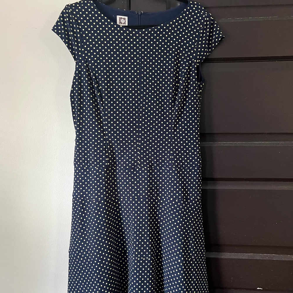 Absolutely adorable navy blue and yellow polka dot dress.
